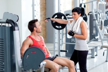man and woman friends on sport fitness gym relaxed