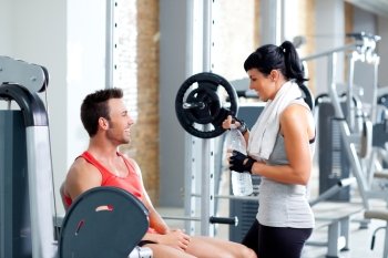 man and woman friends on sport fitness gym relaxed