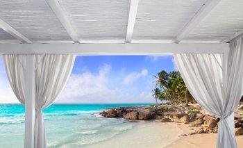 Gazebo white in tropical Caribbean beach with palm trees