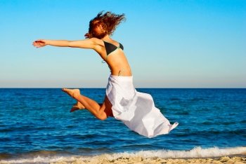 Woman jumping in the air