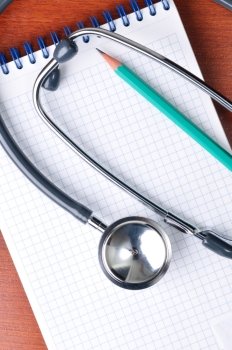 stethoscope on a notepad