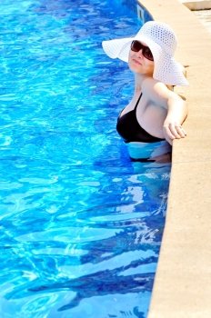 Woman in a pool relaxing