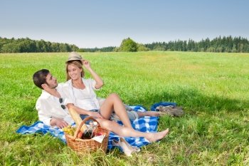 Picnic - Romantic happy couple in meadows nature  sunny day