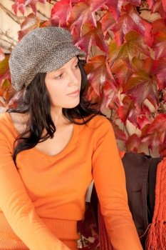 Autumn leaves fashion portrait young woman relax looking aside