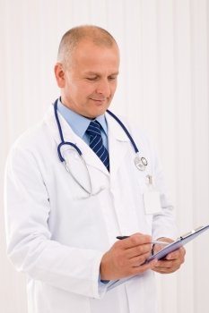 Professional senior doctor male with stethoscope portrait write document folders