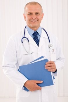 Professional senior doctor male with stethoscope portrait with document folders