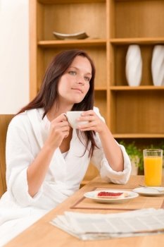 Breakfast coffee and toast dreamy woman  in home bathrobe