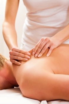 Patient at the physiotherapy gets massage or lymphatic drainage