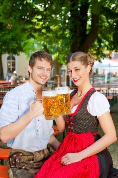 Young couple with beers