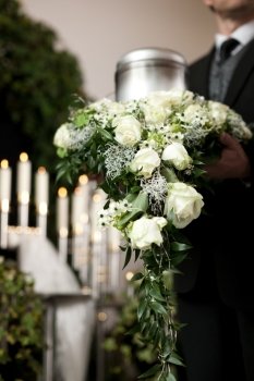 Religion, death and dolor  - funeral and cemetery; urn funeral