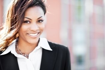 A shot of a beautiful black businesswoman outdoor