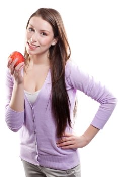 An isolated shot of a beautiful caucasian woman holding an apple