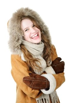 Playful young woman in winter coat on white background