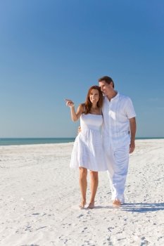 Romantic Man & Woman Couple Walking on An Empty Beach
