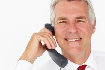 Senior businessman on phone