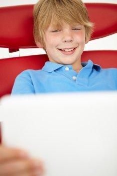 Young boy using laptop