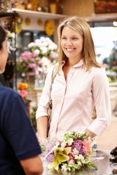 Woman shopping in florist