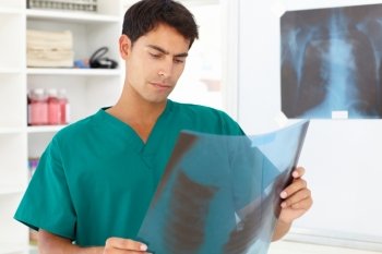 Young male doctor with x-ray