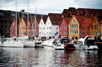 Boats moored at a harbor, Bryggen, Bergen, Norway
