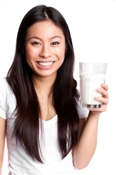 An isolated shot of a beautiful asian woman holding a glass of milk