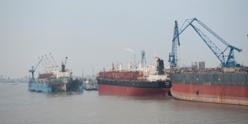 Container ship at a commercial dock, Yangtze River, Shanghai, China