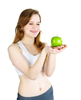 Healthy happy young woman holding green apple