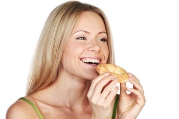 woman eating a cake on a white background