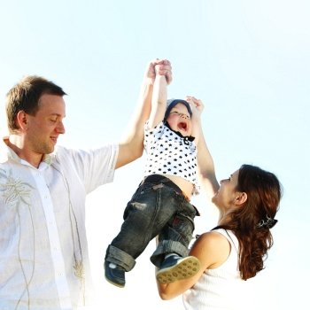 happy family on blue sky background