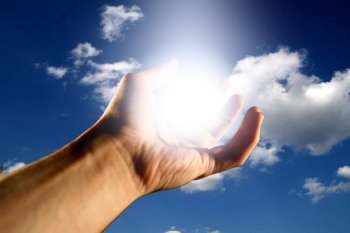 Hand holding the sun
