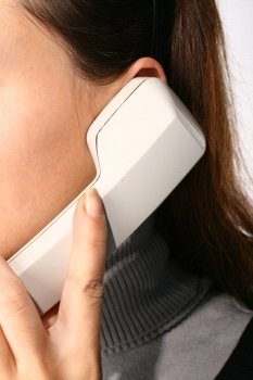 phone ring in human hand on white