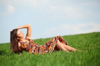 Woman lying in a field