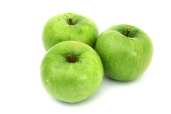 green apples pile isolated on white