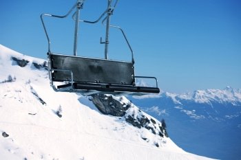 elevator ski mountains on background