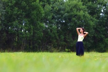 woman on green grass field