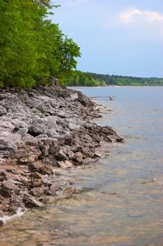 rocky shore of the river in summer