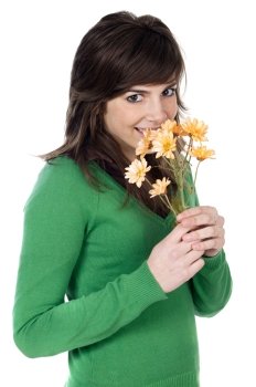 attractive girl with flowers a over white background