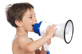 adorable child with a megaphone a over white background