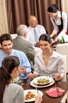 Business people enjoy lunch at the restaurant management discussion