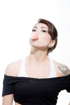 Attractive Young Woman Blowing Bubble Gum