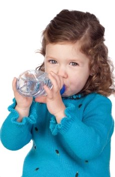 Beautiful baby girl with drinking with a water bottle isolated over white background