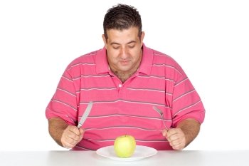 Fat man eating a apple isolated on white background