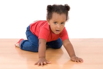 Adorable and beautiful african baby a over wooden floor