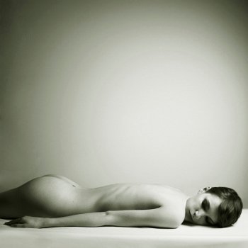 Nude elegant woman in bed. Art photo.