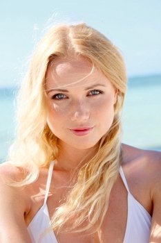 Portrait of beautiful woman in bikini at the beach