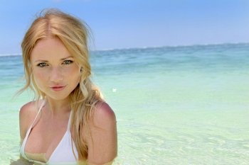 Beautiful blond woman in ocean water