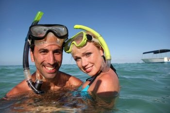 Couple with snorkeling equipment