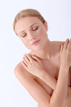 Beautiful woman taking care of her skin