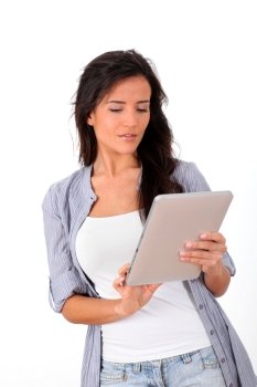 Young woman with digital tablet on white background