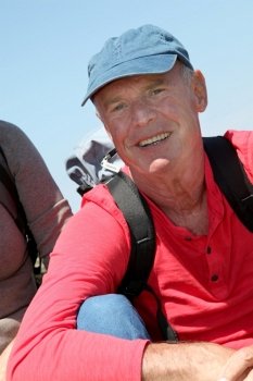 Portrait of senior man in hiking outfit