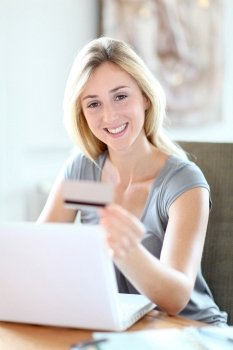 Young woman doing online shopping